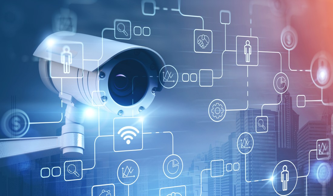 Surveillance street camera in city and icons